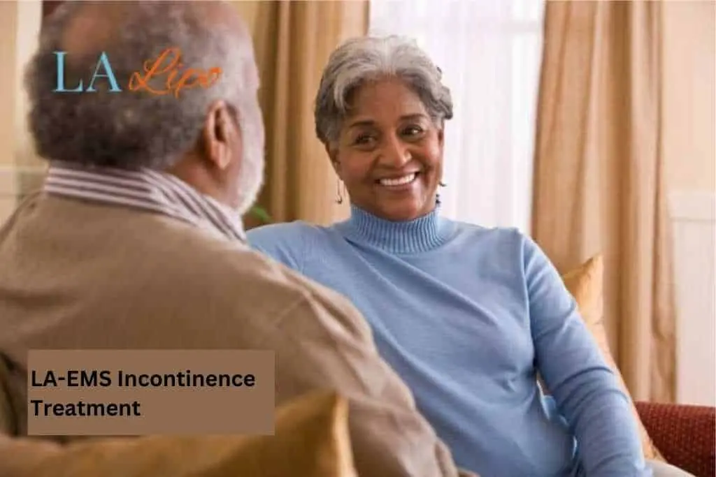 Couple sat smiling at each other - LA-EMS treatment West Ruislip