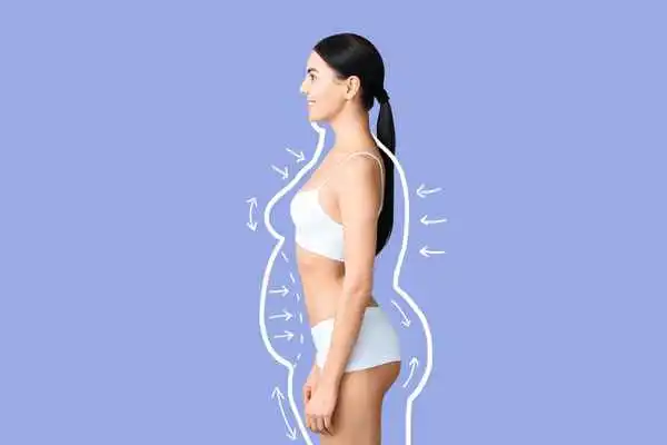 image of woman experiencing fat reduction treatment West Ruislip